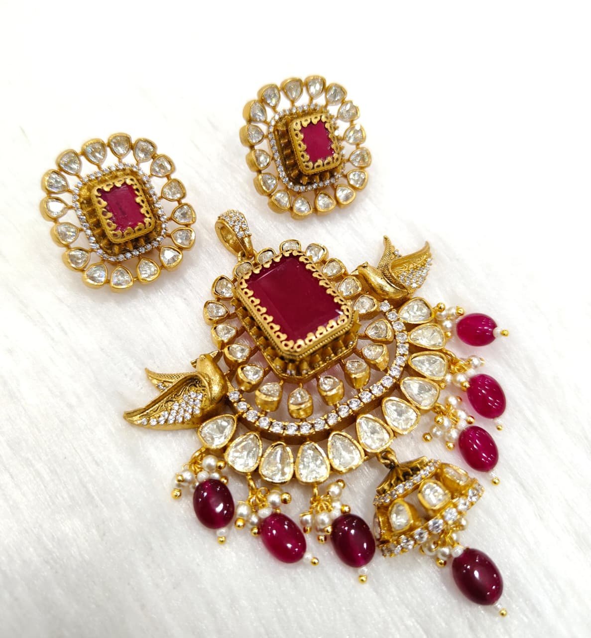 PEOCOCK PENDANT SET 22CT POLISH